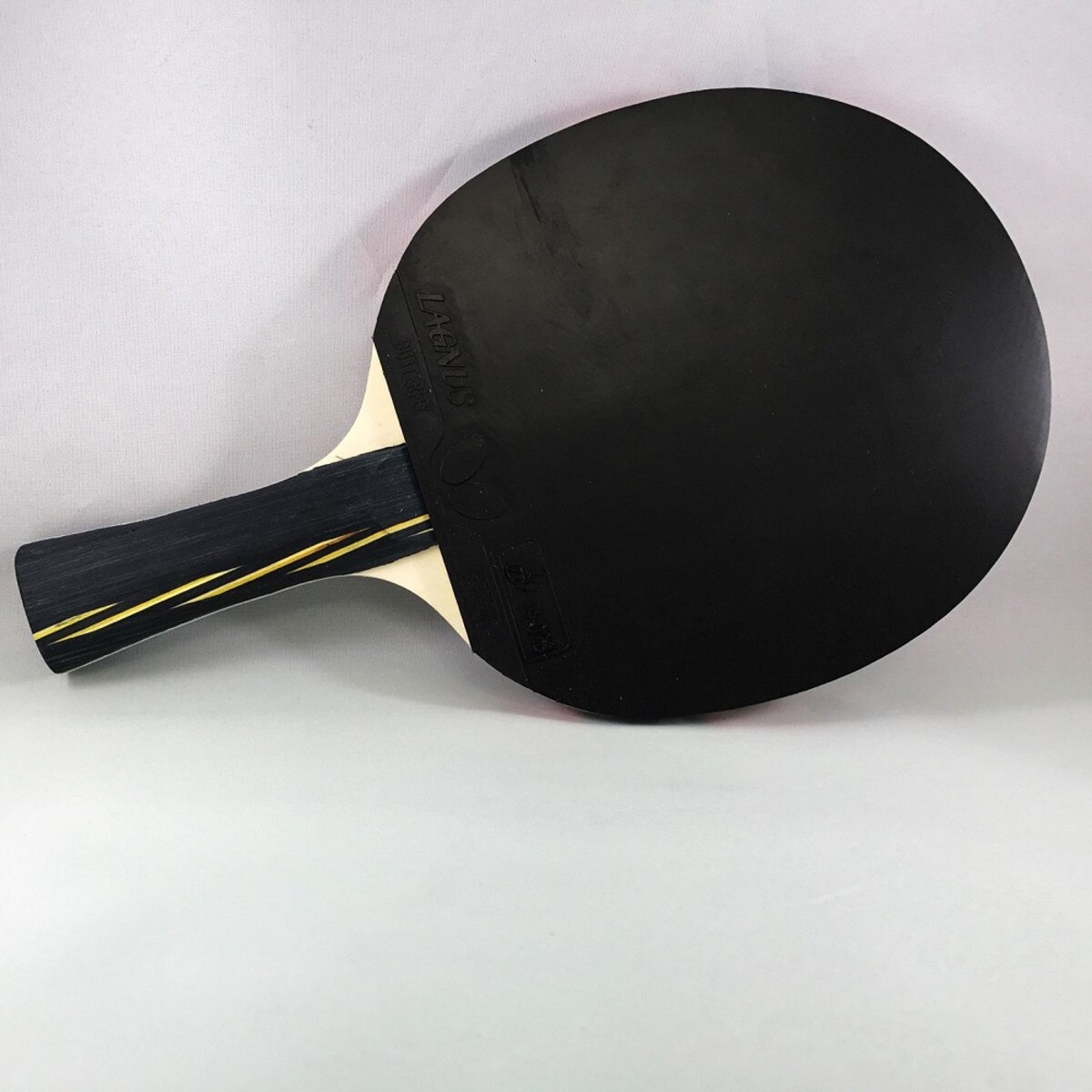Butterfly RDJ S6 Racket: Diagonal View of the Black Rubber